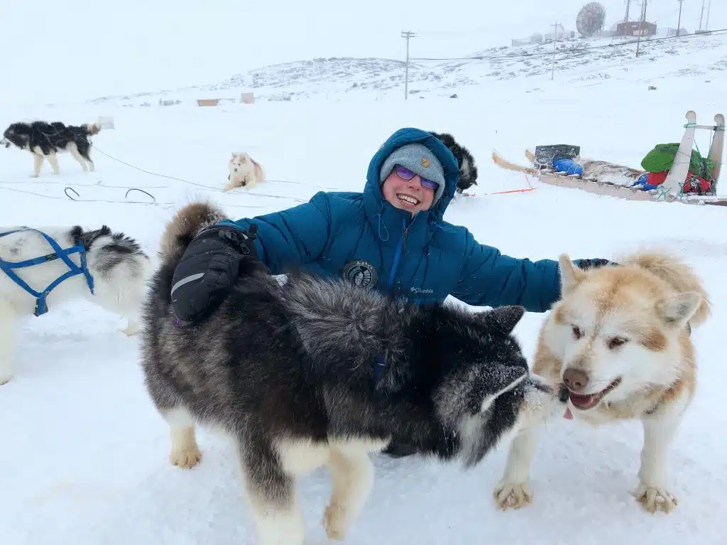 Mikaela posing with dogs