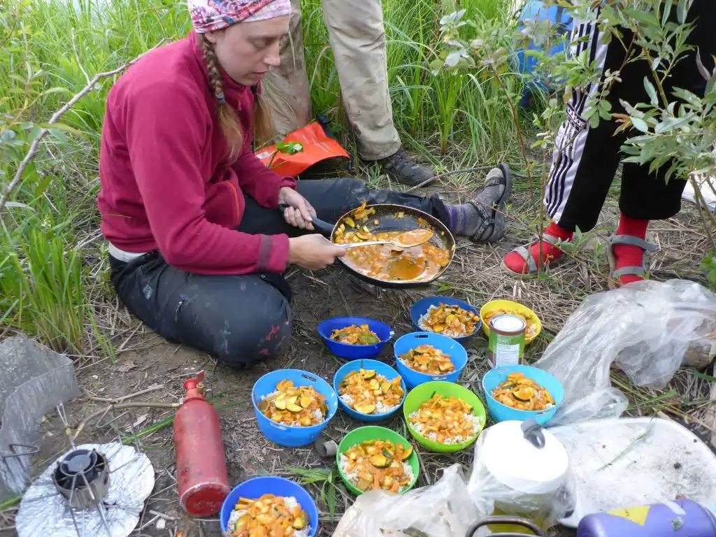 Serving Thai Red Curry on a canoe camping trip