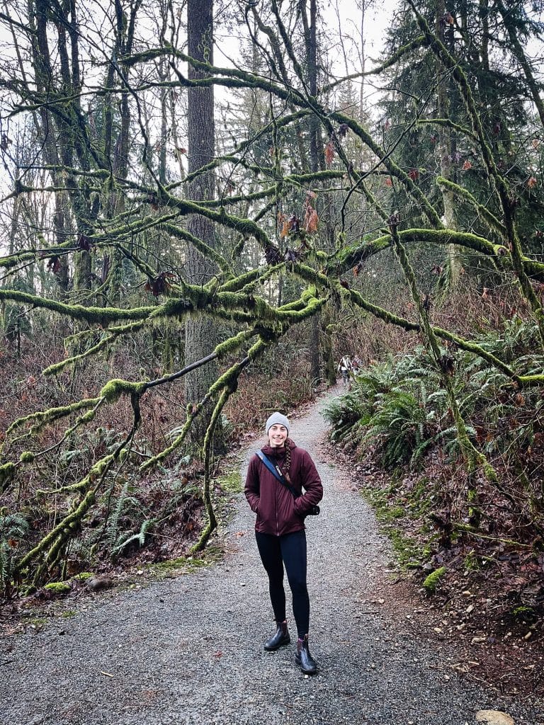 Mikaela standing on a Vancouver hike in Burnaby Mountain