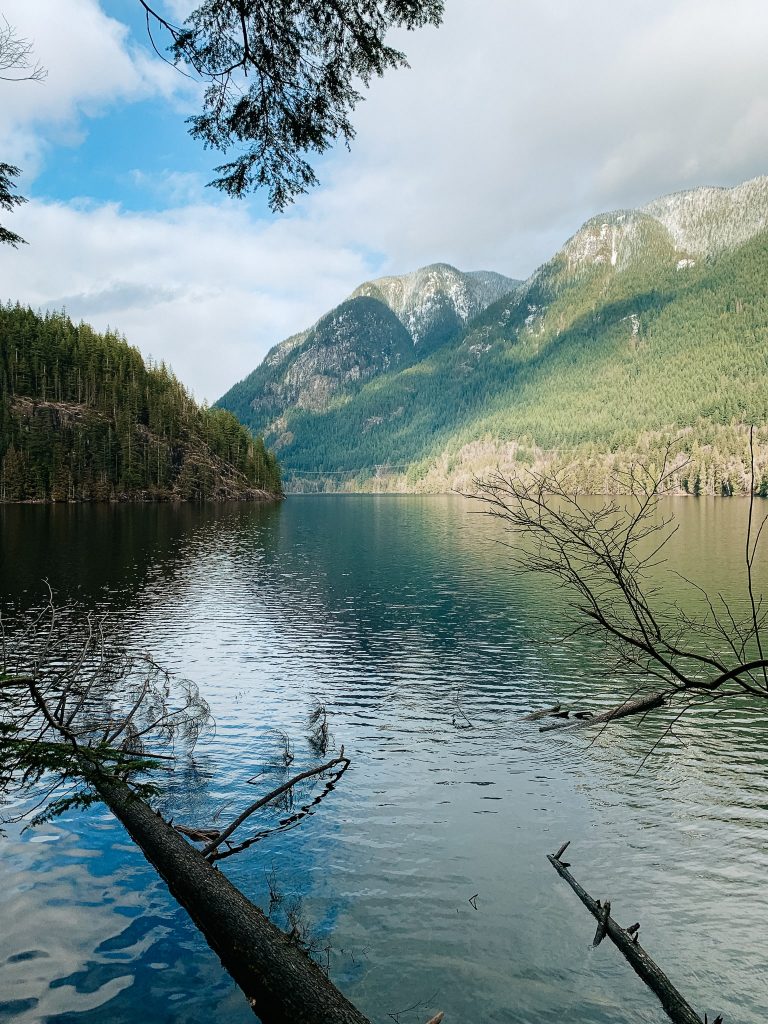 View of the mountains surrounding Buntzen Lake from the hiking trail