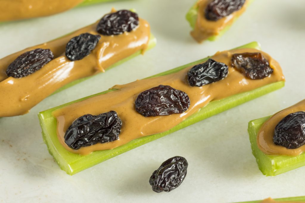 Ants on a log - celery, peanut butter and raisins - an excellent snack for hiking.