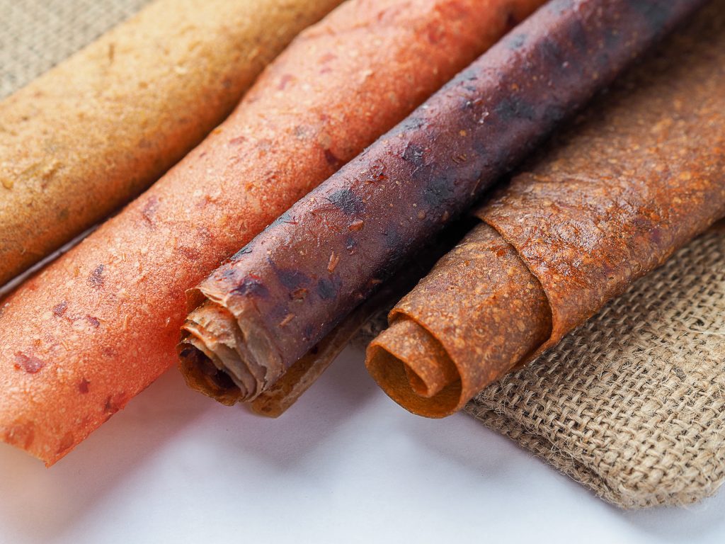 Fruit leather is a good hiking snack. You can make it at home by dehydrating apple sauce in the oven.